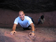 Gerard Climbing Out of Bet Giyorgis (St. George's Church) in Lalibela