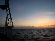 Approaching the Gili Islands at Sunset