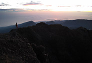 Hiker Taking in the View of the Sunrise