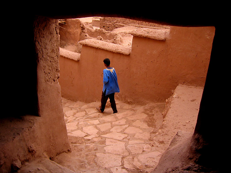 Boy in Narrow Alleyway