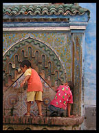 Children in Water Fountain