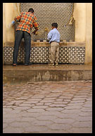 Man and Boy at Water Fountain