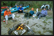 Eating Dinner Around the Campfire