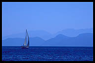 Sailboat on a Hazy Horizon