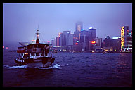 Ferry Crossing Hong Kong Harbor at Dusk