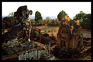 Lion Statue Overlooking the Jungle at Phnom Bakheng Temple