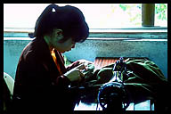 Girl at a Sewing Machine