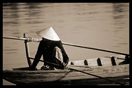 Woman in a Boat on the River