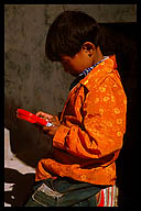 Young Boy with Video Game
